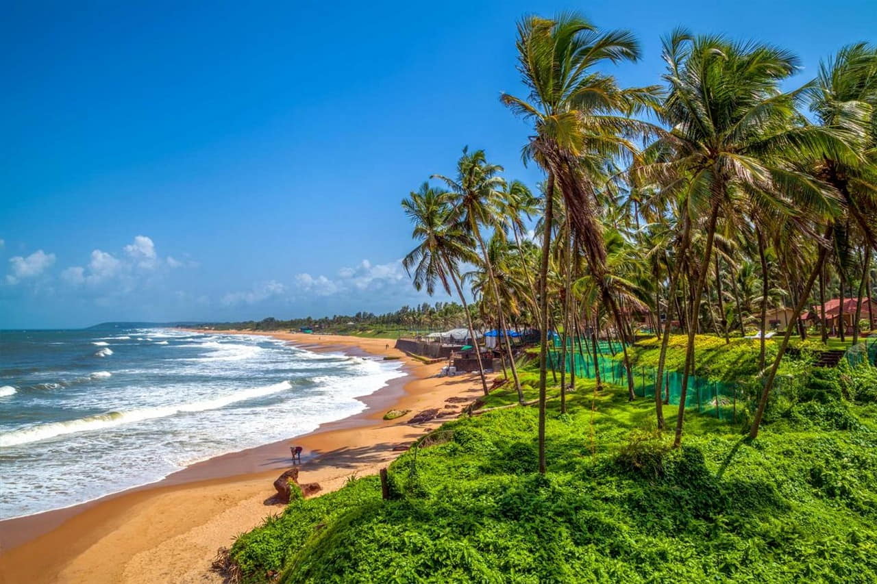 Beautiful golden sandy beach at sunset in Mangalore